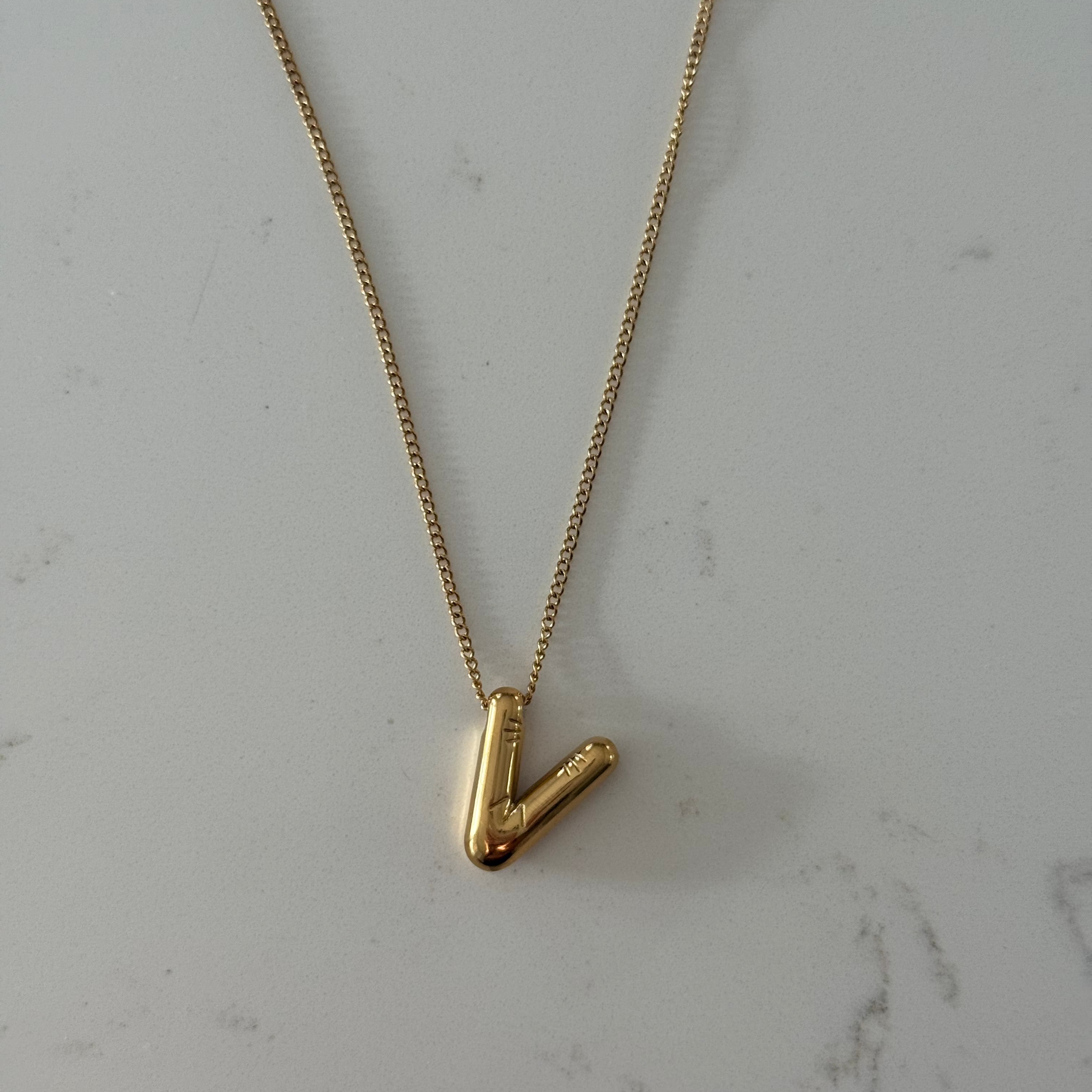 Gold balloon initial necklace