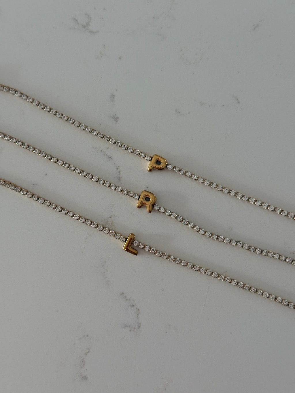 Iced out bubble initial bracelet