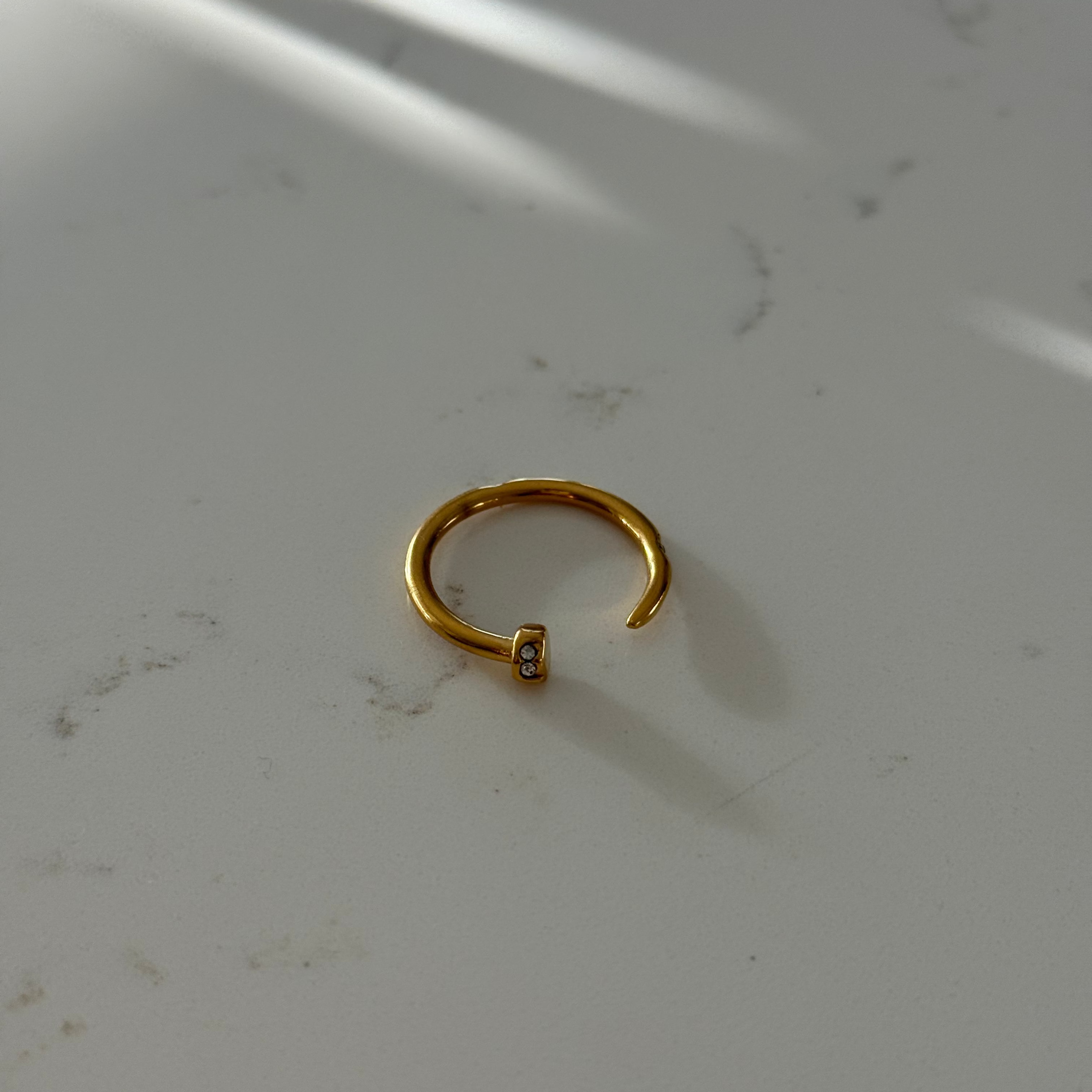 Gold nail ring